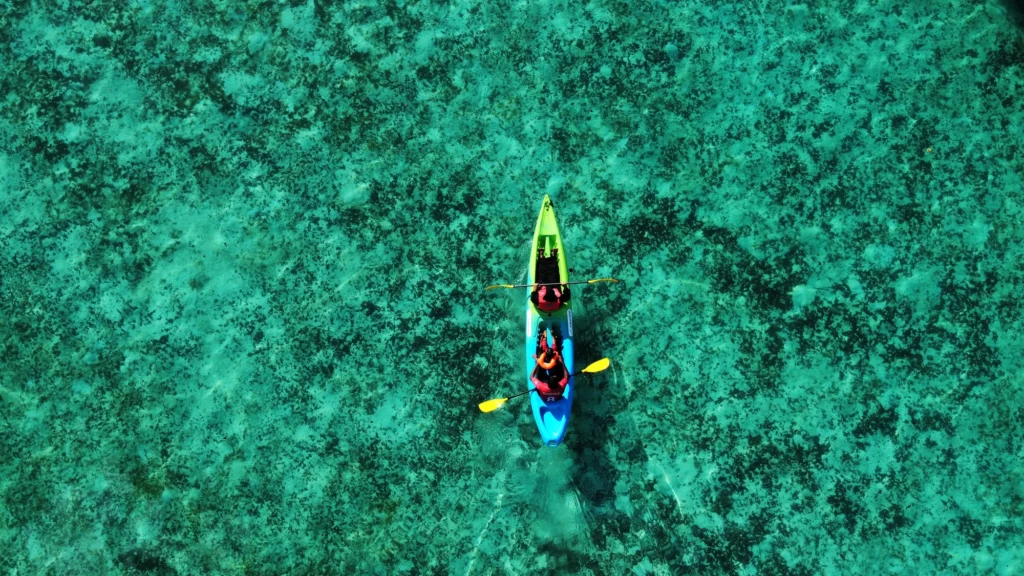 Kayaking over Kadmath Island reef waters