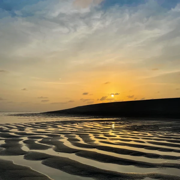 Sunset across an island beach