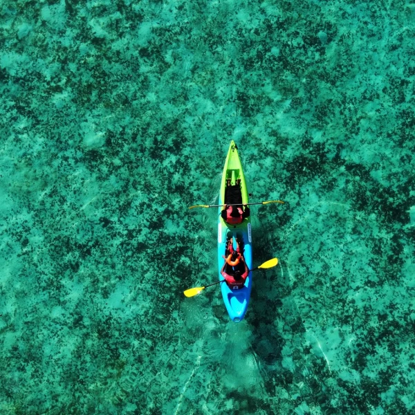 Kayaking over Kadmath Island reef waters